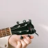 How to Tune a Guitar With a Tuner